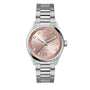 The TAG Heuer Carrera Date features a pink dial with diamond hour markers, date display, and a stainless steel bracelet.