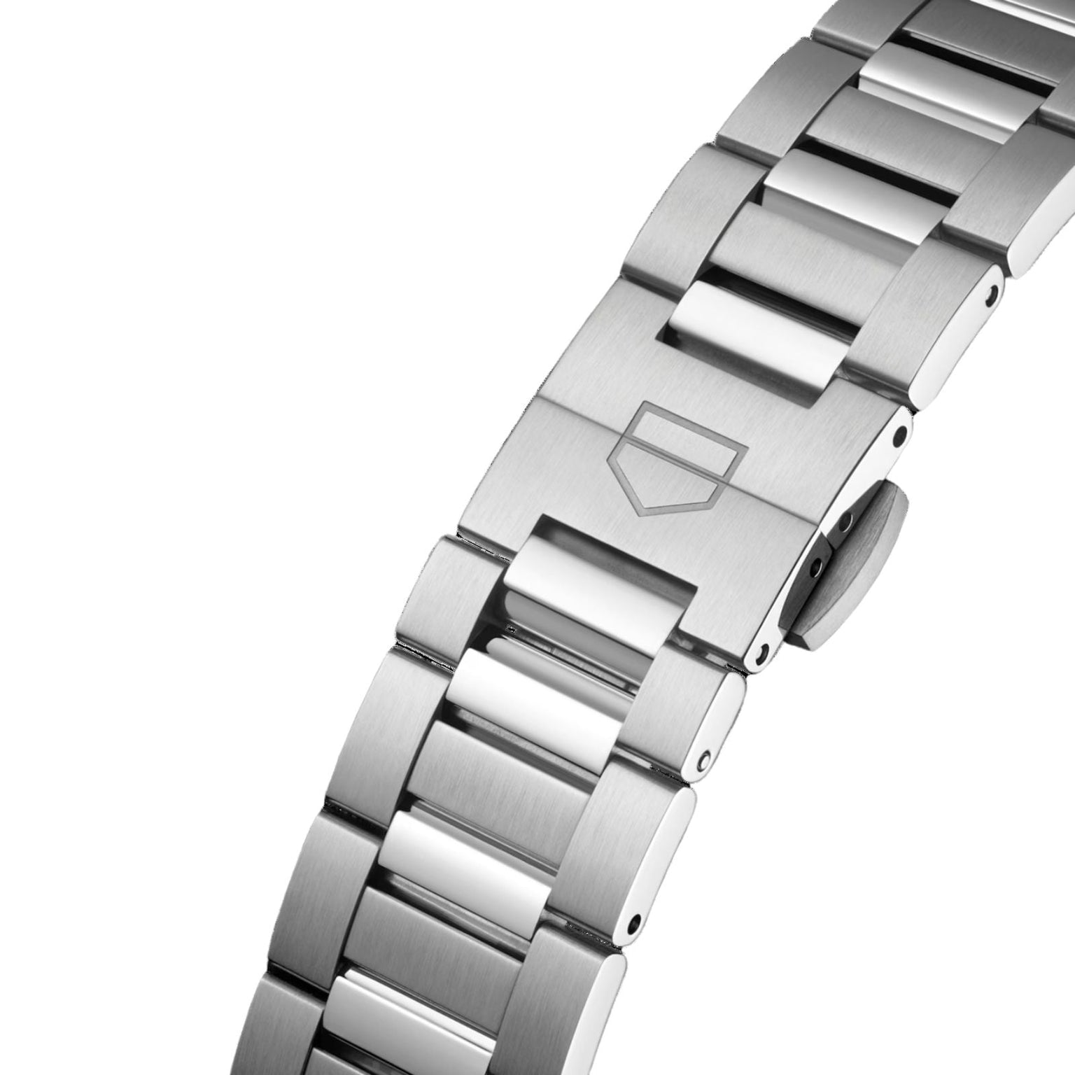 Close-up of a TAG Heuer Carrera Date stainless steel watch bracelet featuring a clasp engraved with a geometric logo.