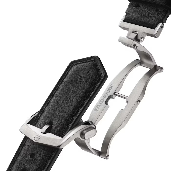Black leather strap with stainless steel buckle and curved metal lugs for chronograph watch attachment.