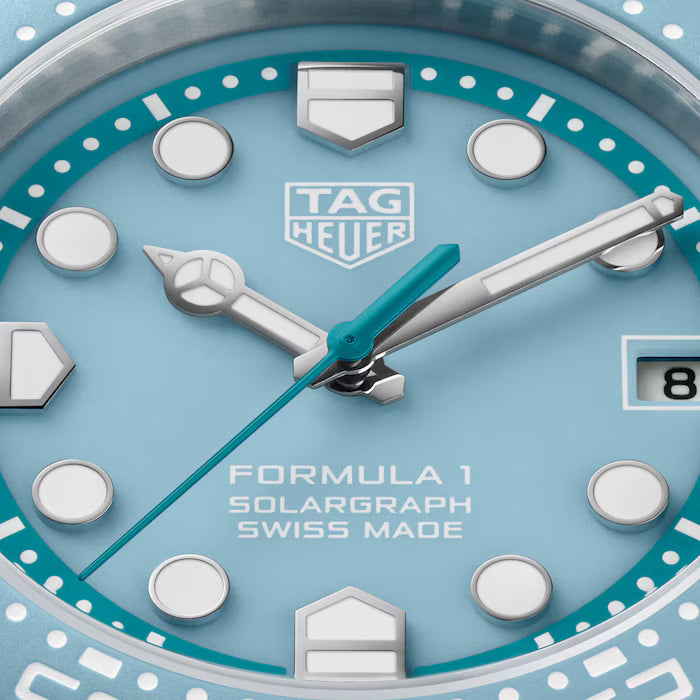 Tag Heuer watch with blue face and silver accents