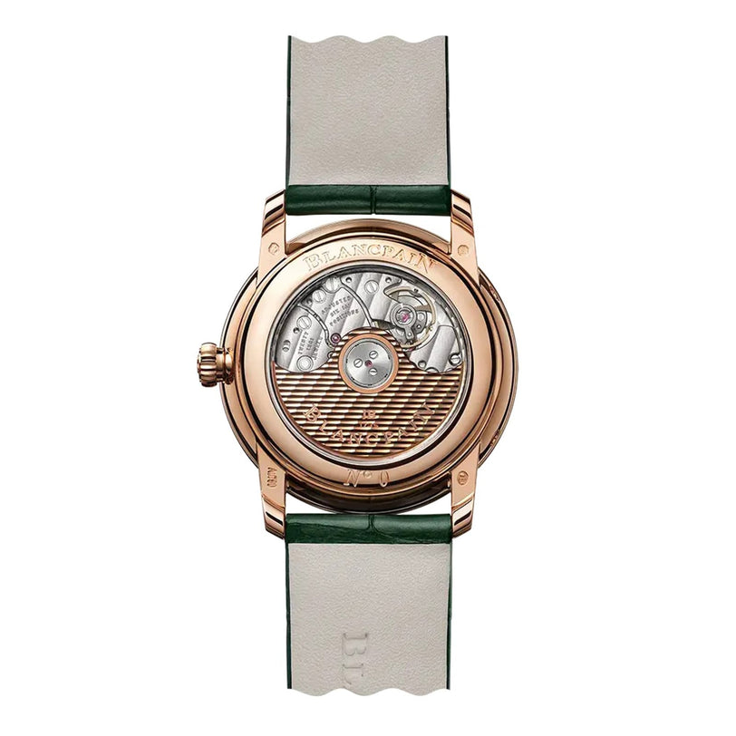 Back view of the Blancpain Villeret Quantième Phases de Lune, featuring an exposed mechanical movement, gold case, and a white leather strap with green edges.