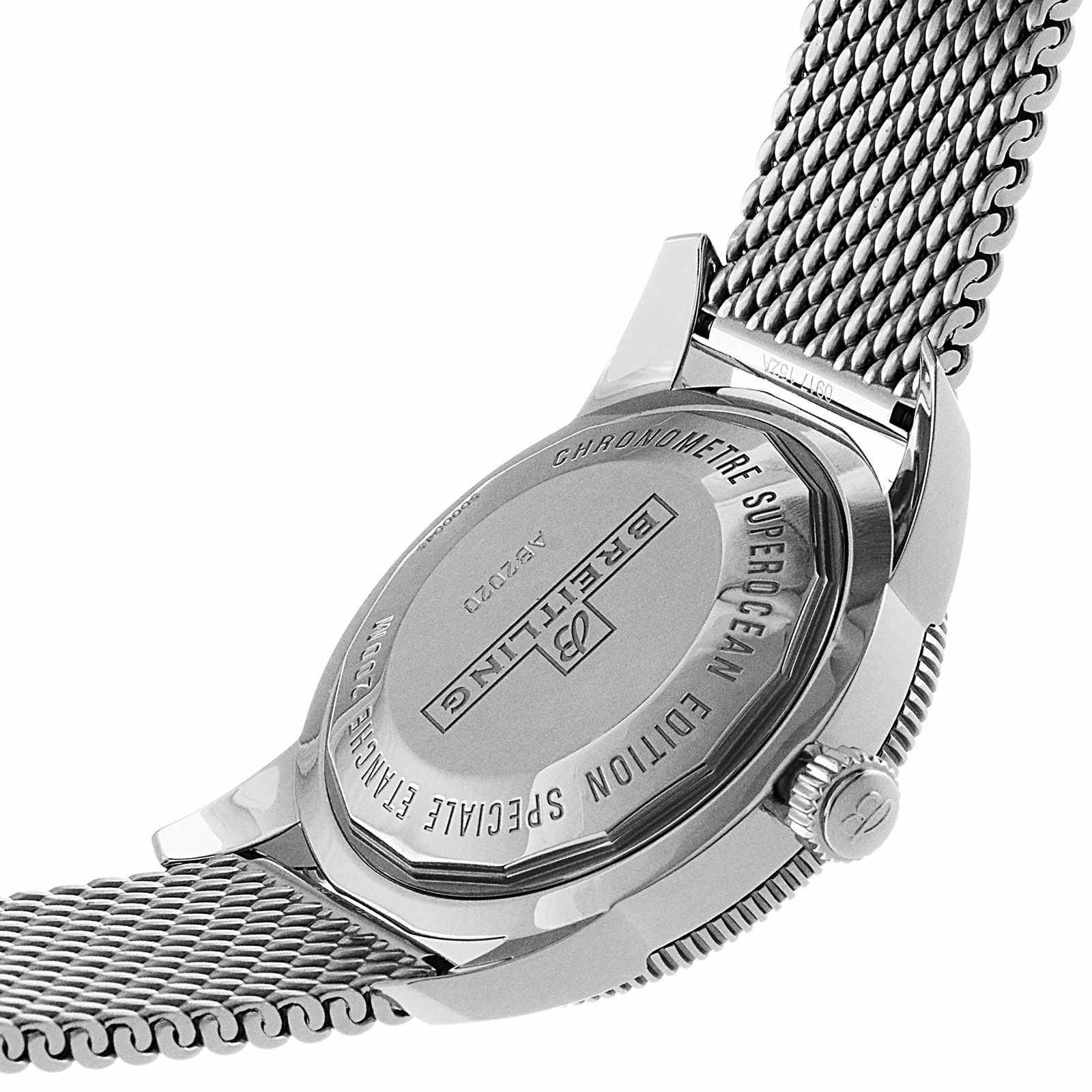Close-up of the back of a Breitling Superocean Heritage B20 Automatic 46 watch, featuring a metal mesh band and engraved case details.