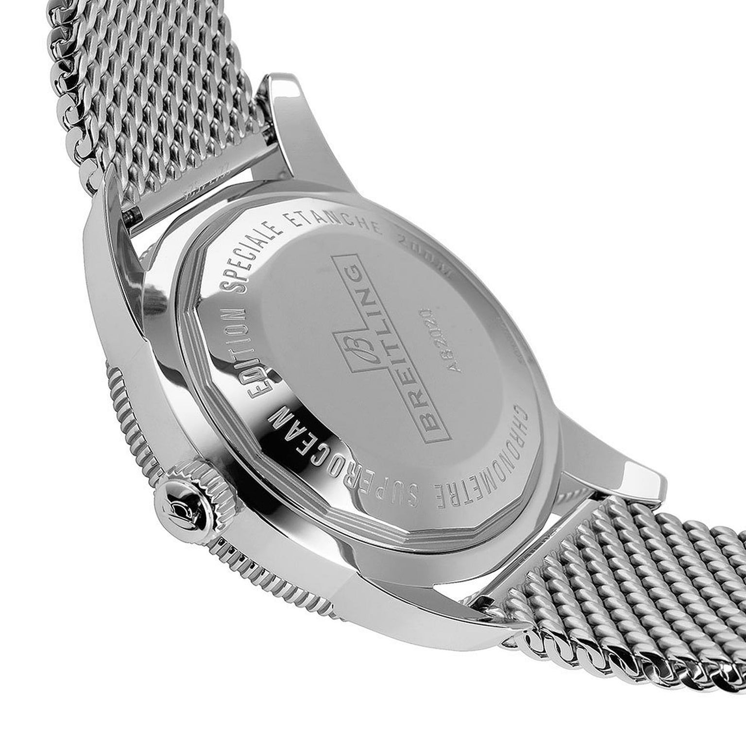 Close-up of the case back on a Breitling Superocean Heritage B20 Automatic 46, featuring engraved text and logo on its stainless steel 46mm case with a metal mesh band.