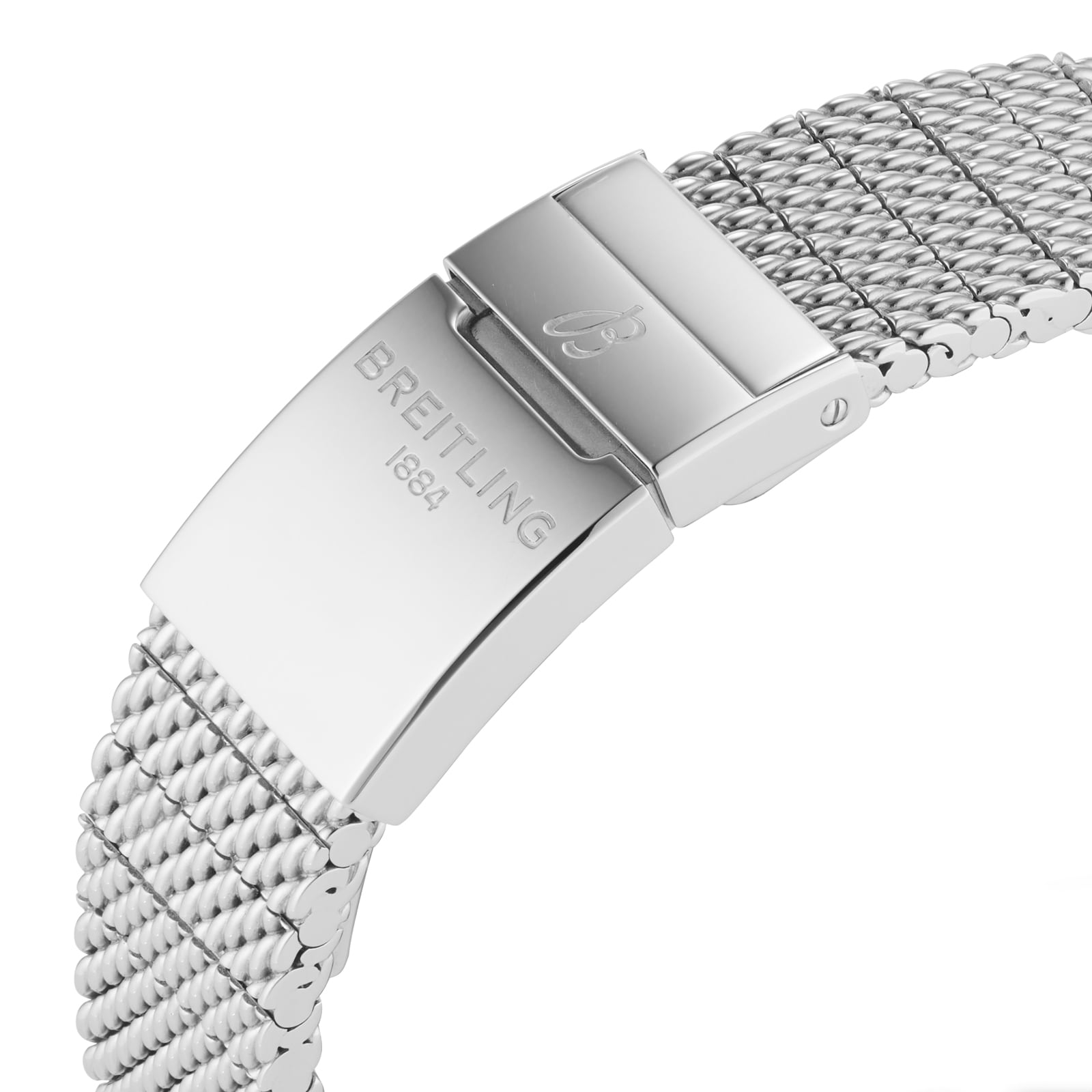 Close-up of a silver Breitling Superocean Heritage B20 Automatic 46 clasp engraved with BREITLING 1884, attached to a woven metal mesh strap and paired with a 46mm stainless steel case.