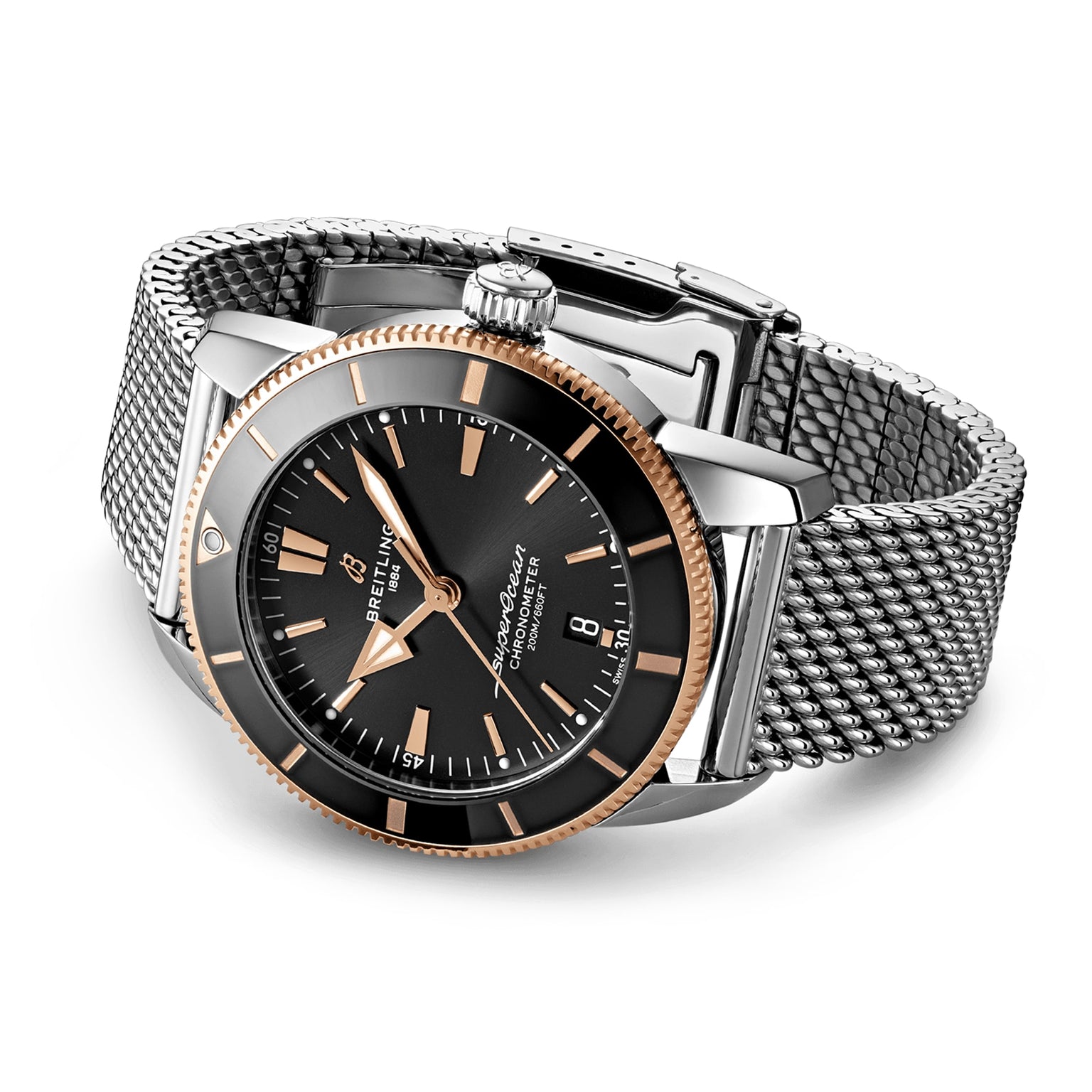 The Breitling Superocean Heritage B20 Automatic 44 features a black dial, gold accents, date display, and a water-resistant stainless steel bracelet, shown against a white background.