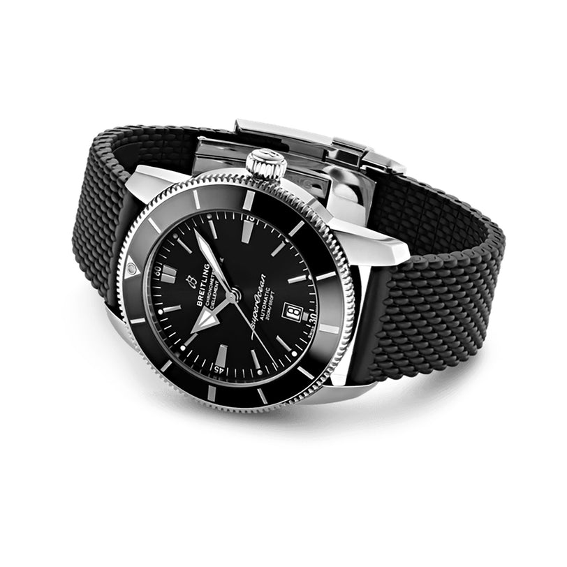 The Breitling Superocean Heritage B20 Automatic 46 showcases a 46mm stainless steel case, black dial with date display, and black rubber strap, presented at an angle on a white background. Powered by the precise Breitling B20 calibre.