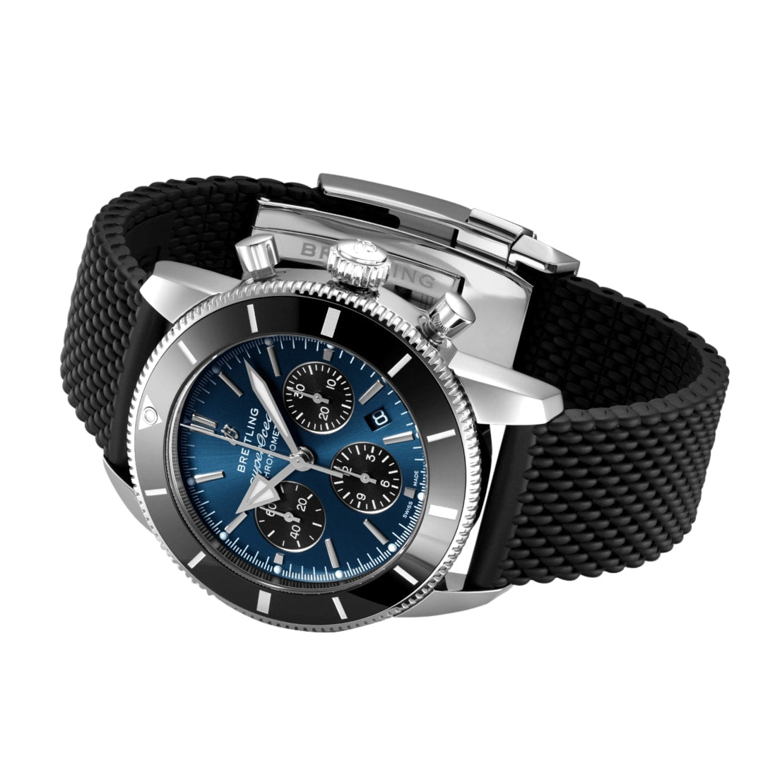 The Breitling Superocean Heritage B01 Chronograph 44 features a stainless steel case, blue dial, black bezel, three subdials, black textured rubber strap, and is water resistant.