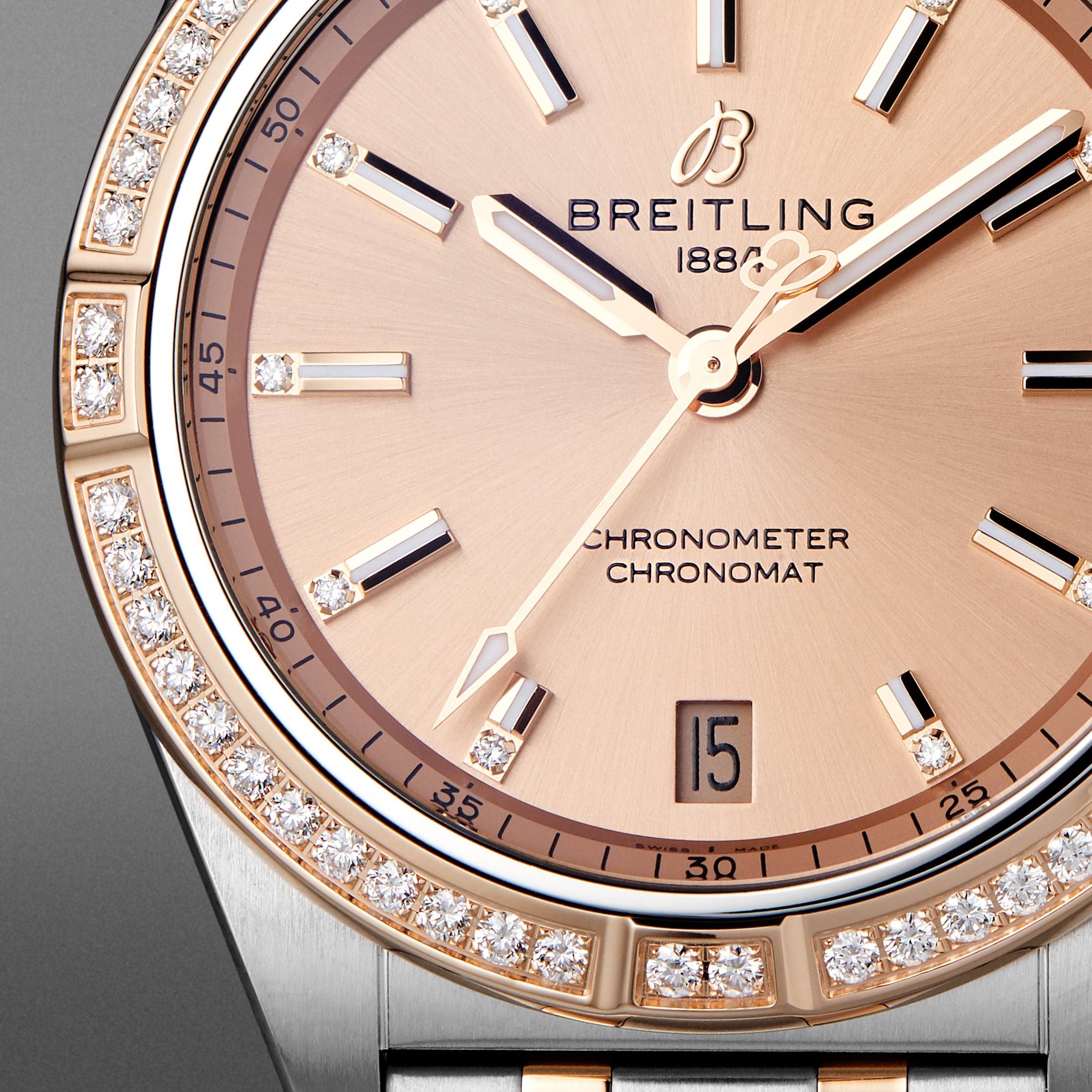 Close-up of the Breitling Chronomat Automatic 36 featuring a gold dial, diamond-set bezel, and date display at 6 o’clock. This COSC-certified chronometer combines elegance and precision.