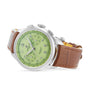 The Breitling Premier B09 Chronograph 40, featuring a green dial and brown leather strap, is displayed at an angle on a white background.