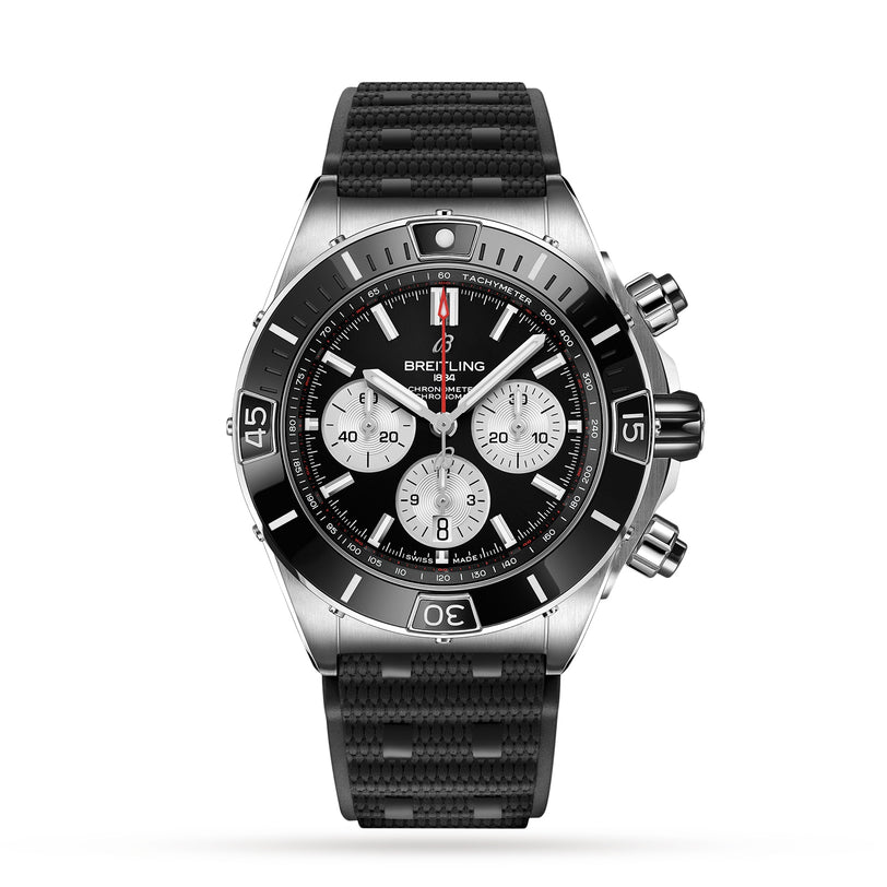 The Breitling Super Chronomat B01 44 features a black bezel, black dial with three subdials, silver markers, a black textured rubber strap, and is powered by the precision Breitling 01 COSC certified calibre.