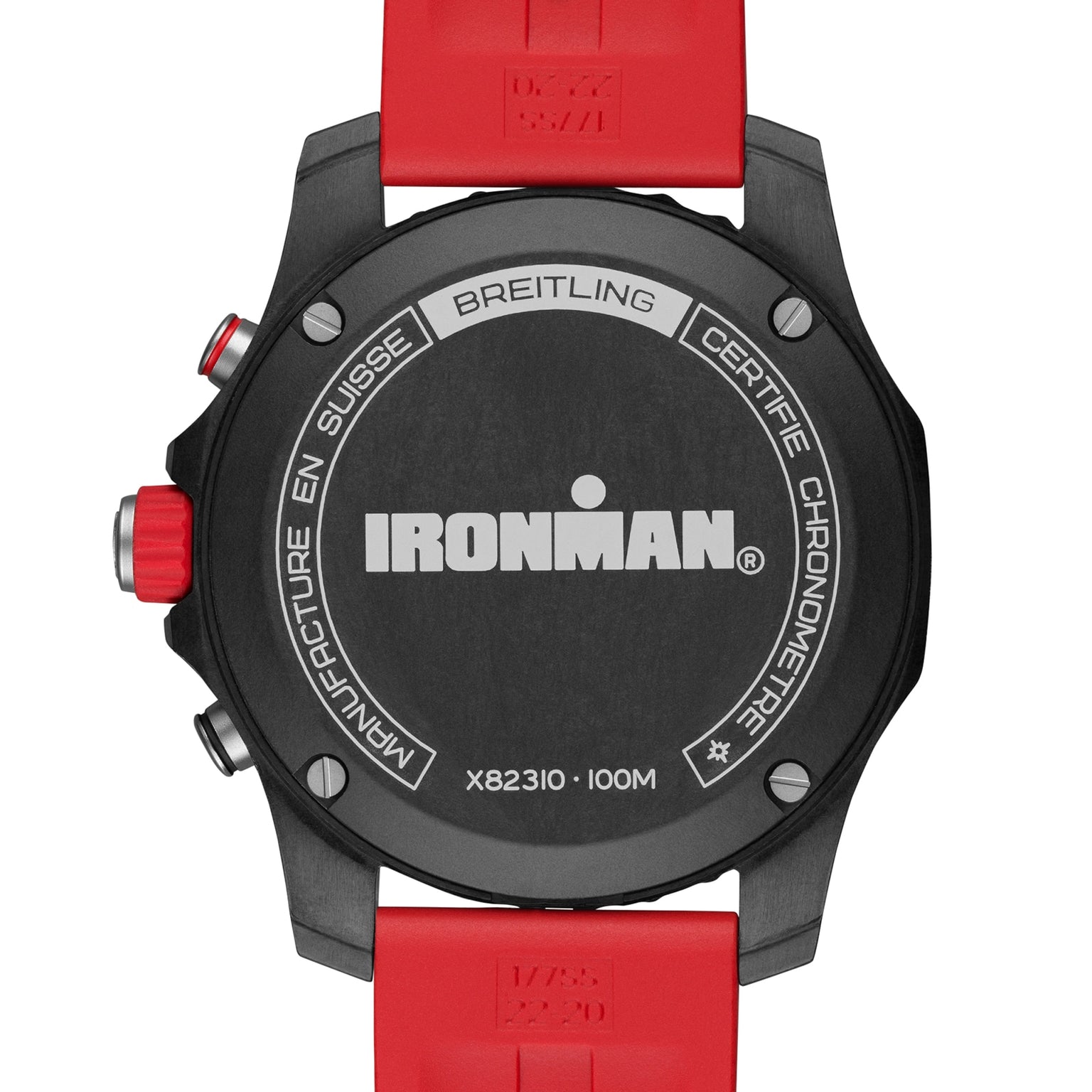 Back view of the Breitling Endurance Pro 44 IRONMAN® watch with a red strap, displaying engravings MANUFACTURE EN SUISSE, CERTIFIE CHRONOMETRE, 100M water resistance, and featuring a SuperQuartz™ chronograph movement.