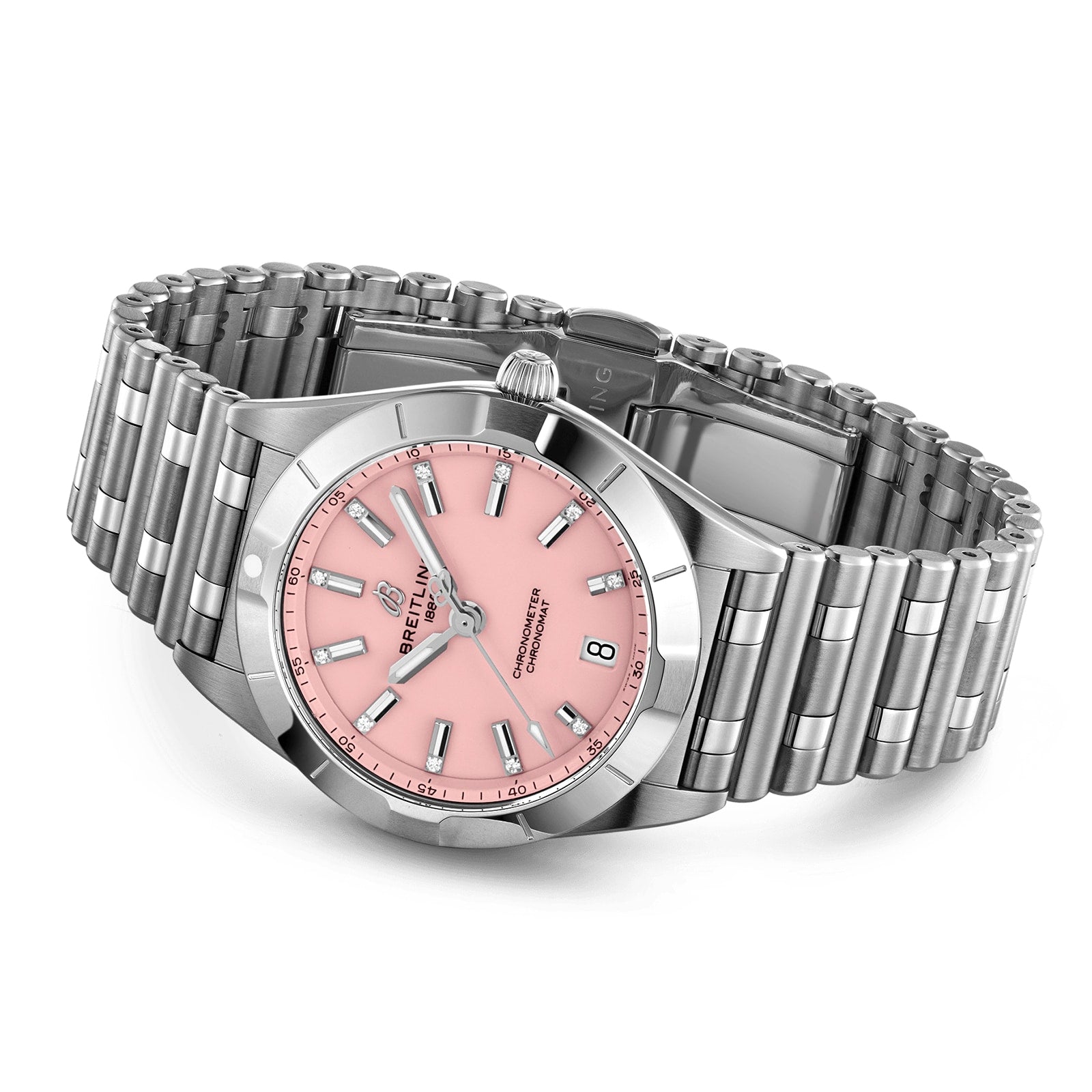 The Breitling Chronomat 32 is a stainless steel wristwatch featuring a pink dial, silver hour markers, Rouleaux bracelet, and date window, powered by the Breitling 77 calibre, shown at an angle on a white background.