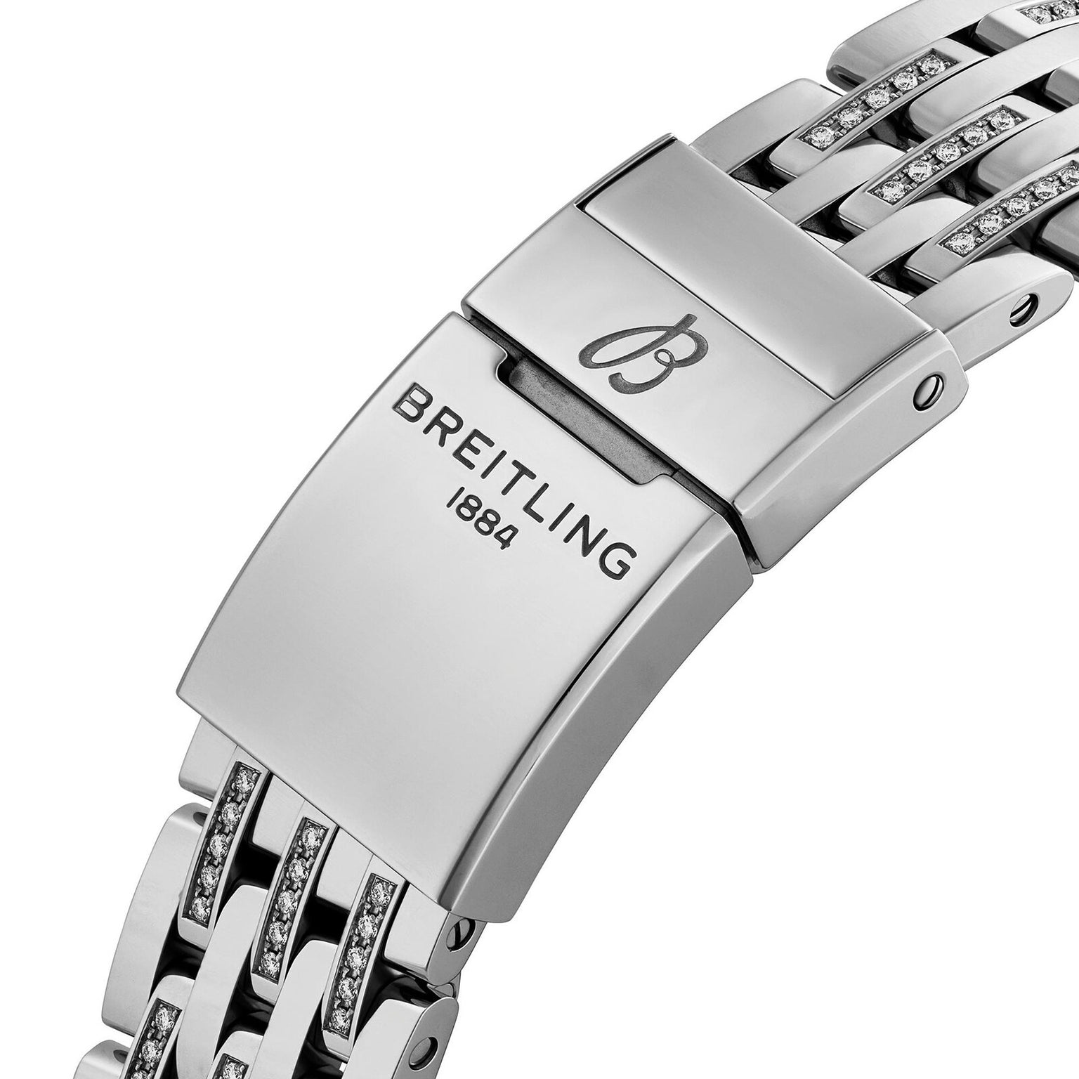 Silver clasp engraved with the Breitling logo and 1884, attached to a diamond-set metal link bracelet on the Breitling Navitimer 32.