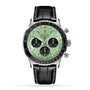 The Breitling Navitimer B01 Chronograph 43 features a mint green dial with three black subdials, chronograph pushers, and a black leather strap with white stitching, powered by the acclaimed Breitling 01 calibre for precision.