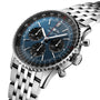The Breitling Navitimer B01 Chronograph 41 is shown at an angle, featuring a blue dial with three subdials, black bezel, stainless steel case, and metal link bracelet.