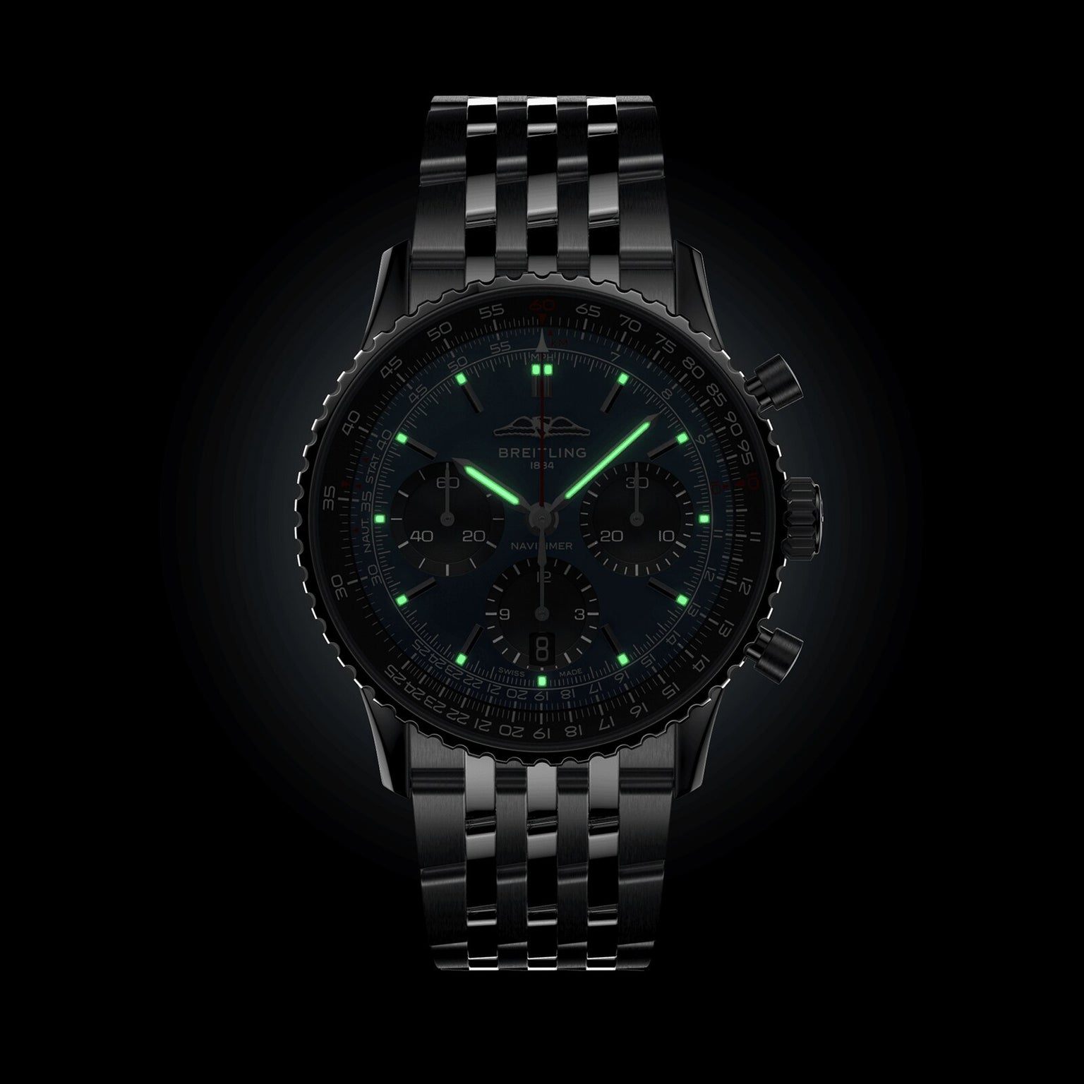 A Breitling Navitimer B01 Chronograph 41 wristwatch features a black dial, metal link band, and luminous green markers and hands, displayed against a dark background.