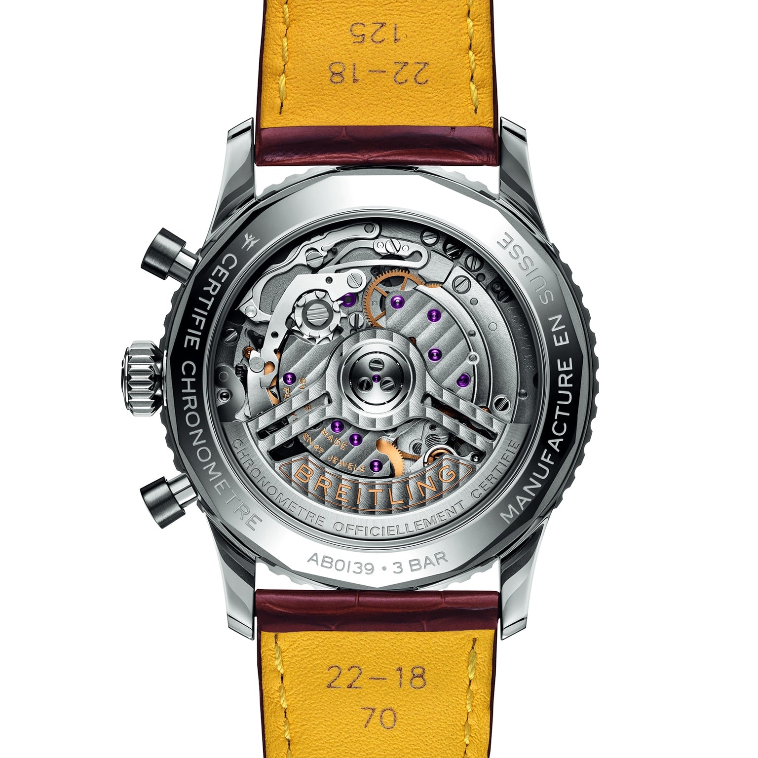 Close-up of the back of the Breitling Navitimer B01 Chronograph 41, showcasing its exposed mechanical movement, engraved details, and signature yellow leather strap.