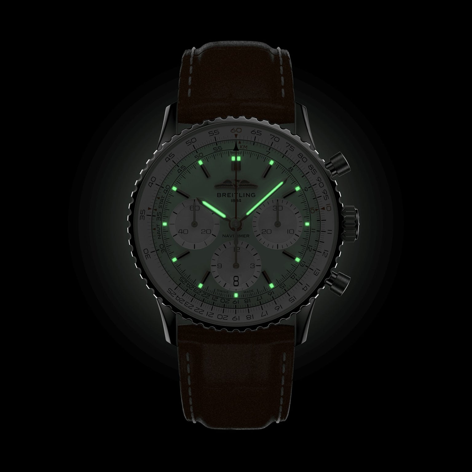 The Breitling Navitimer B01 Chronograph 41 is a pilots watch featuring a black leather strap and luminous green markers and hands for visibility in the dark.
