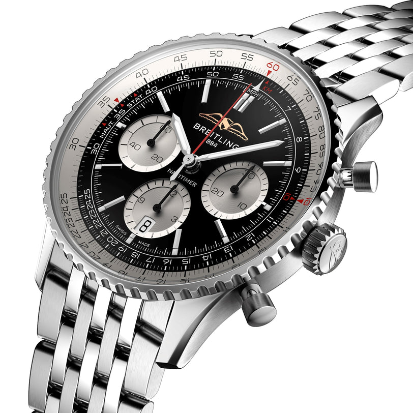 Close-up of a Breitling Navitimer B01 Chronograph 43, featuring a stainless steel case, black dial with three subdials, date window, and metal link bracelet.
