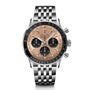 The Breitling Navitimer B01 Chronograph 43 is a stainless steel pilot’s watch with a bronze dial, black subdials, baton markers, and multi-link metal bracelet, powered by the Breitling 01 calibre.