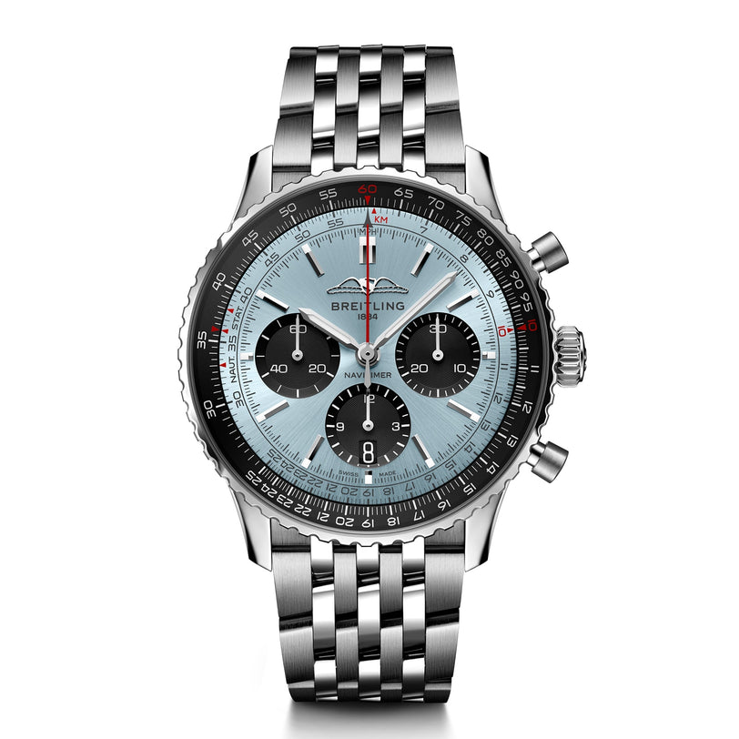 The Breitling Navitimer B01 Chronograph 43 features a silver case, light blue dial with three black subdials, and a metal link band.