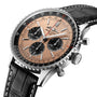 The Breitling Navitimer B01 Chronograph 43 features a stainless steel case, salmon dial with black subdials, black leather strap, silver bezel, and a COSC-certified chronograph movement.