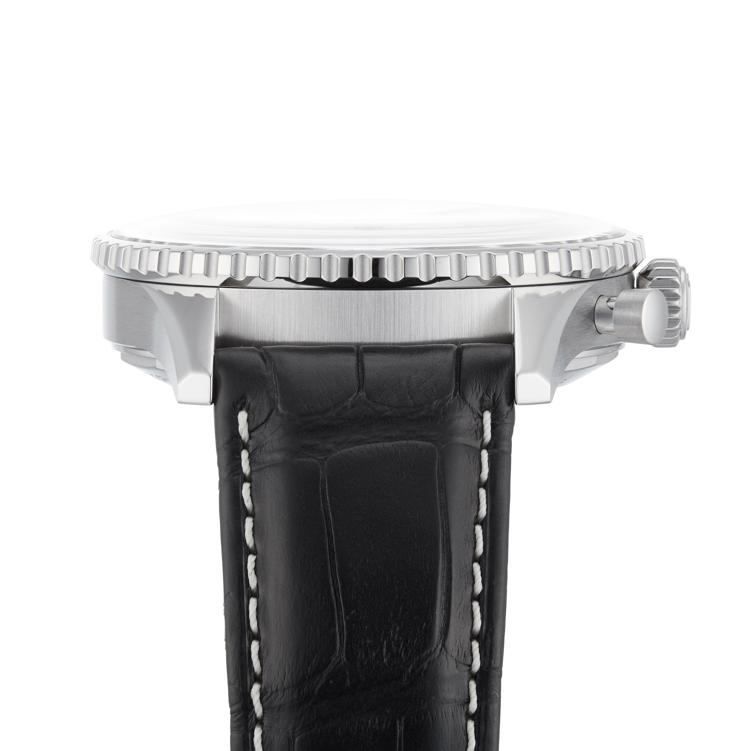 Side view of a silver Breitling Navitimer B01 Chronograph 43 with a ridged bezel, black leather strap, and visible crown, powered by the Breitling 01 calibre, displayed on a white background.