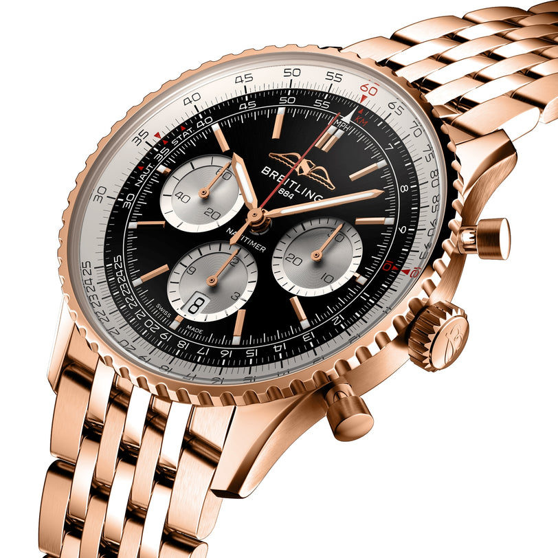The Breitling Navitimer B01 Chronograph 43 has a rose gold case, black dial with three subdials, date window, metal link bracelet, and is powered by the Breitling 01 calibre.