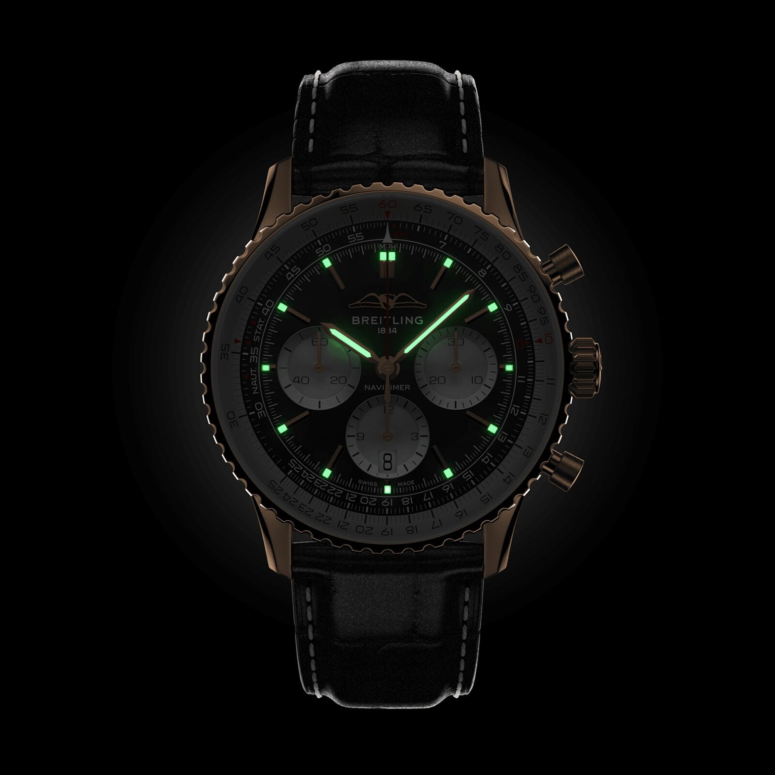 The Breitling Navitimer B01 Chronograph 43 is a black pilots watch with leather strap, three subdials, and green luminescent hands and markers, displayed against a dark background.
