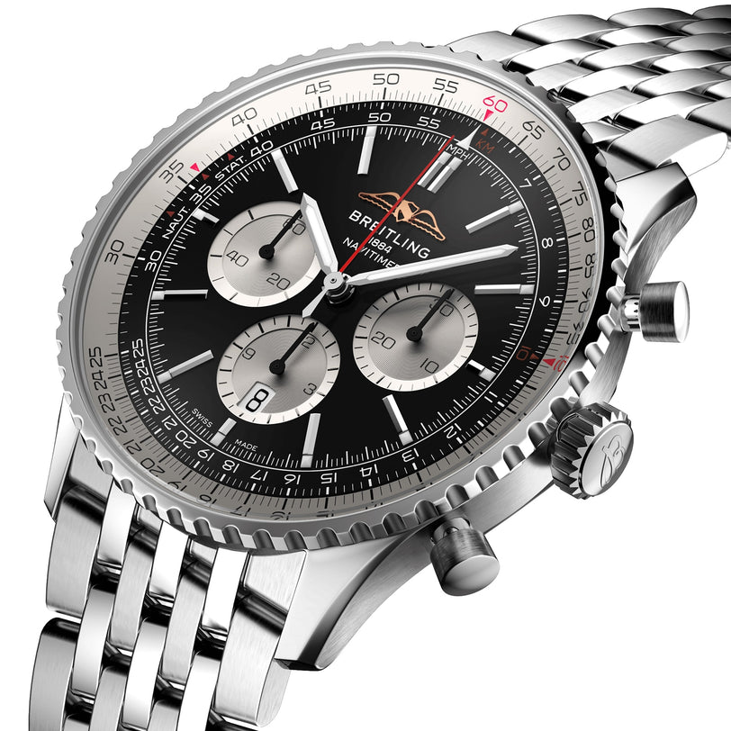 A close-up of the Breitling Navitimer B01 Chronograph 46, a stainless steel pilot’s watch featuring a black dial, three subdials, date display, and metal bracelet.