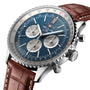 The Breitling Navitimer B01 Chronograph 46 is a stainless steel pilot’s watch with a blue dial, three subdials, date window, and a brown leather strap.