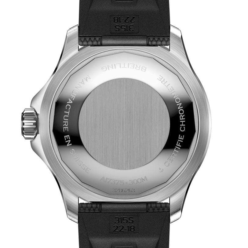 The back of the Breitling Superocean Automatic 42 features engravings, a brushed center, and comes with a black rubber strap, powered by the Breitling 17 calibre.