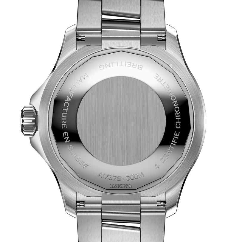 Close-up of the back of a Breitling Superocean Automatic 42 dive watch, featuring engraved text and a brushed stainless steel finish.
