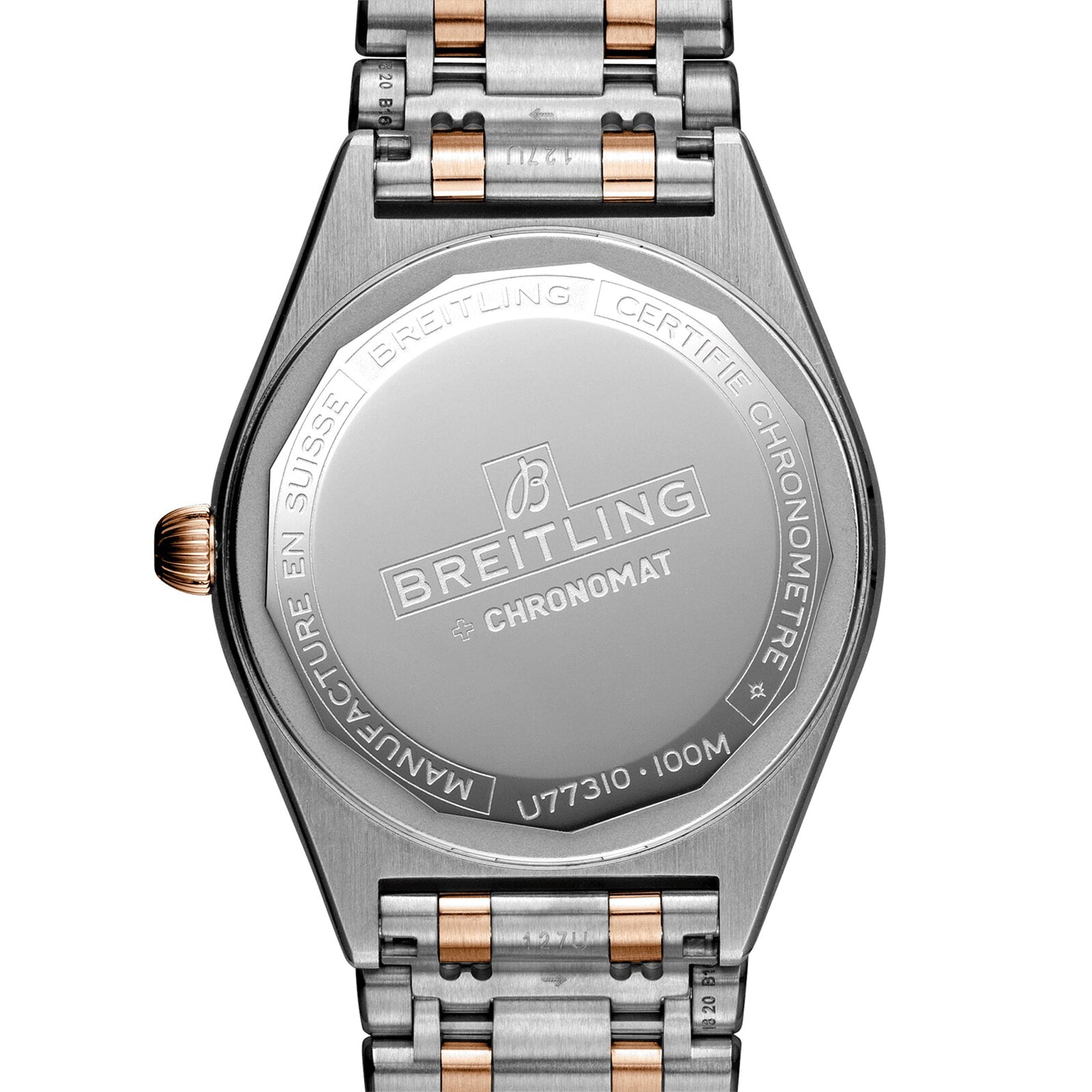 Back of a Breitling Chronomat 32 watch featuring engraved branding and a metal bracelet.