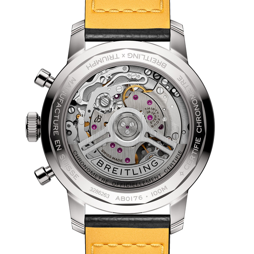 Close-up of the Breitling Top Time B01 Triumphs transparent case back, showcasing the detailed Breitling 01 calibre movement and engraved branding from the exclusive Triumph collaboration.