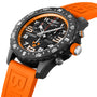 A close-up of the Breitling Endurance Pro 44 Princeton® University Edition, featuring a black bezel, pulsometer scale, and orange rubber strap in Breitlight®.