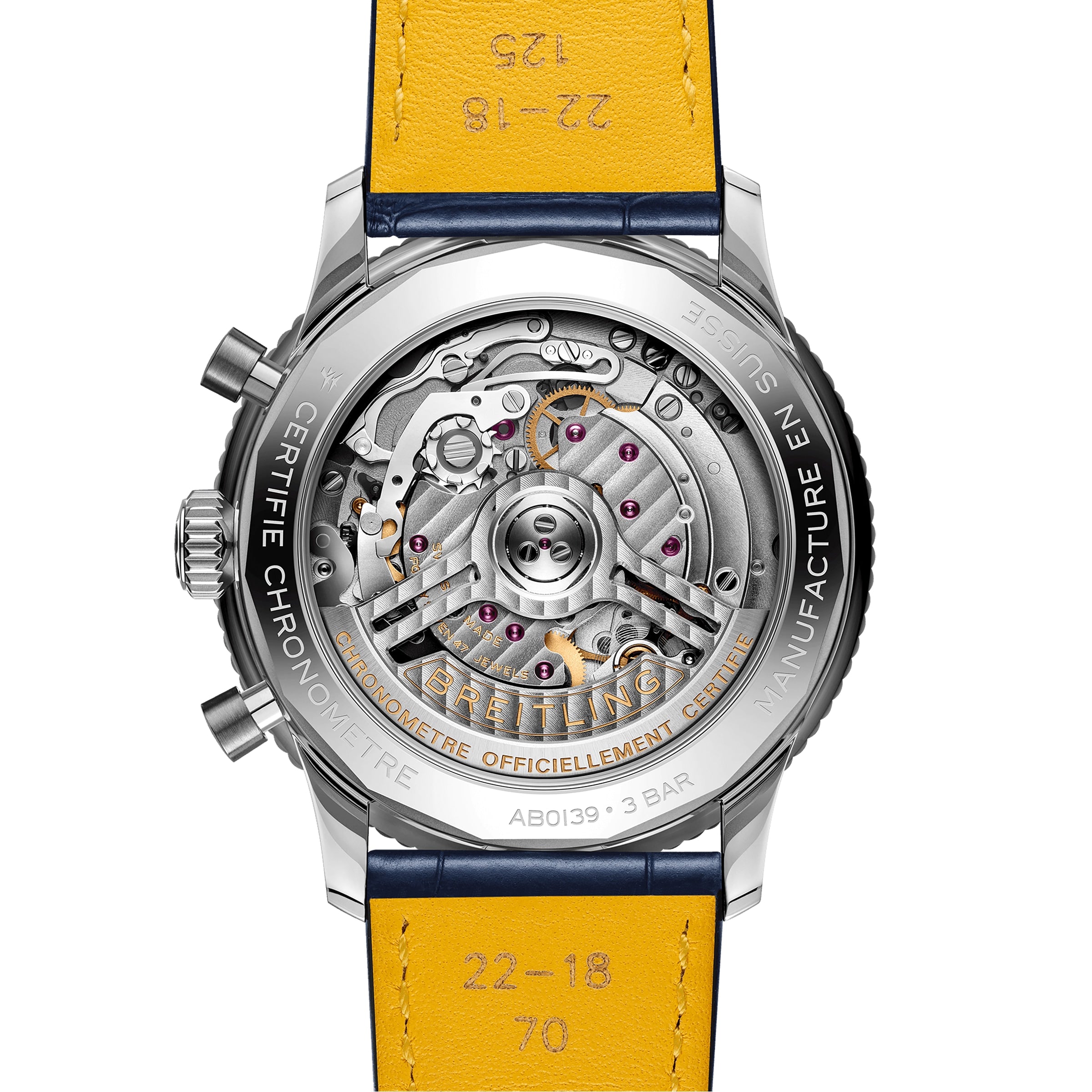 Close-up of the Breitling Navitimer B01 Chronograph 41s back, showcasing its exposed Breitling 01 calibre movement, detailed gears, and engraved stainless steel case with a yellow leather strap.