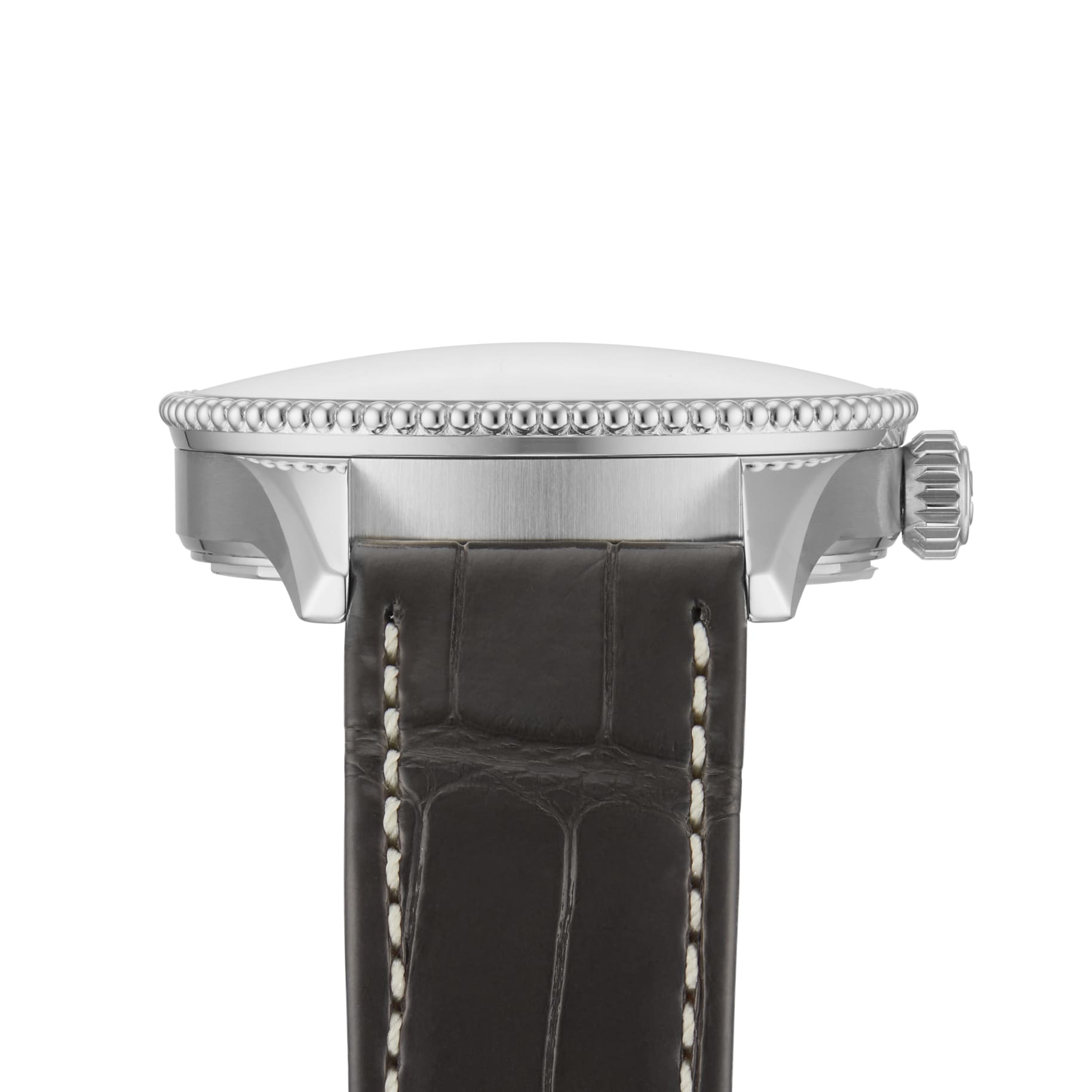 Side view of the Breitling Navitimer Automatic 36, featuring a metal case, textured bezel, crown, anthracite dial, and a black leather strap with white stitching.