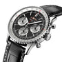 Close-up of the Breitling Navitimer B01 Chronograph 41, showing its black dial with three subdials, silver bezel, and a black leather strap with white stitching.
