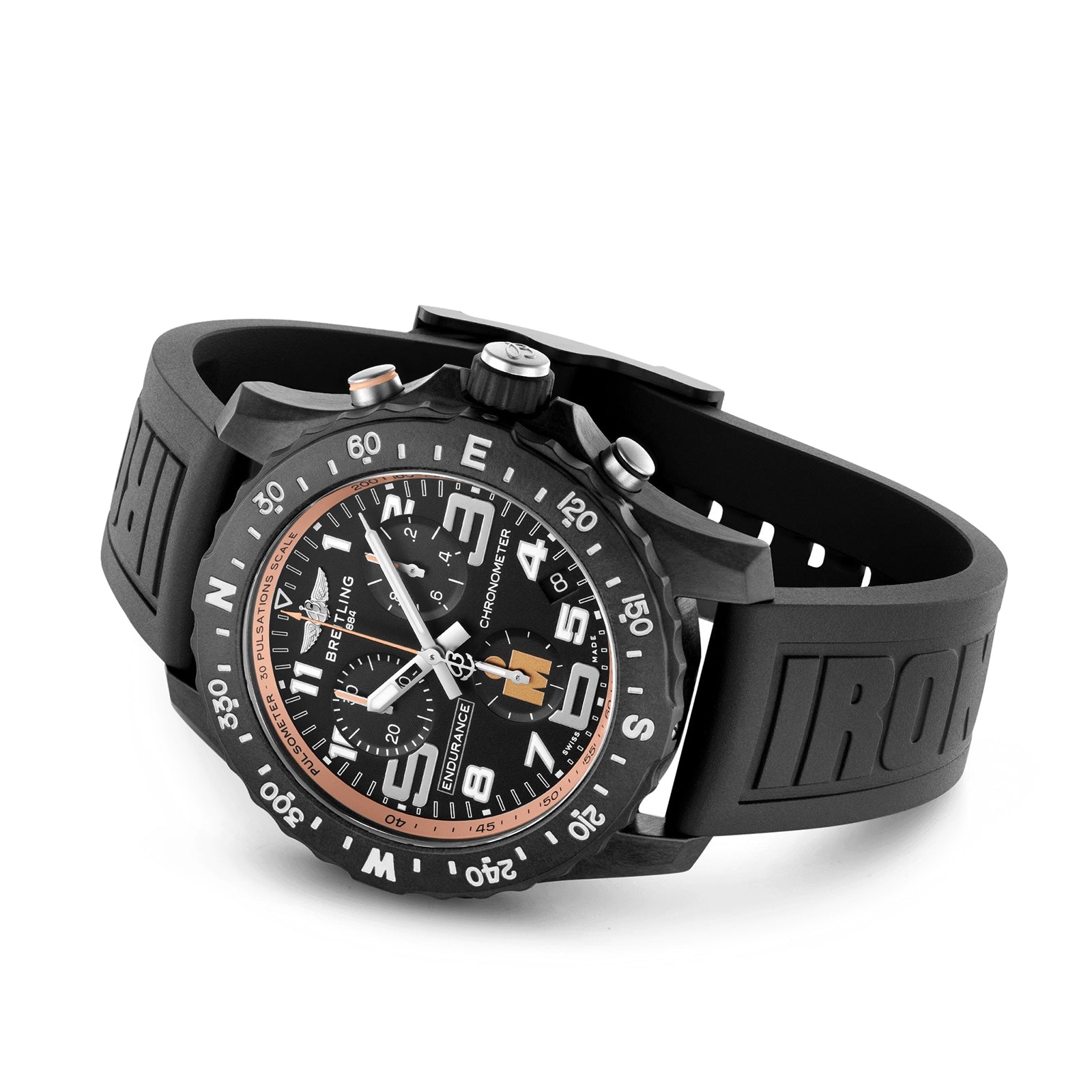 A black Breitling Endurance Pro 44 IRONMAN® Finisher watch with a chronograph dial, bold numerals, and a sturdy black Breitlight® case on a rubber strap is shown against a white background.