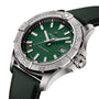 The Breitling Avenger Automatic 42 features a green dial, silver hour markers, date display at 3 o’clock, rotating bezel, and a textured military leather strap.
