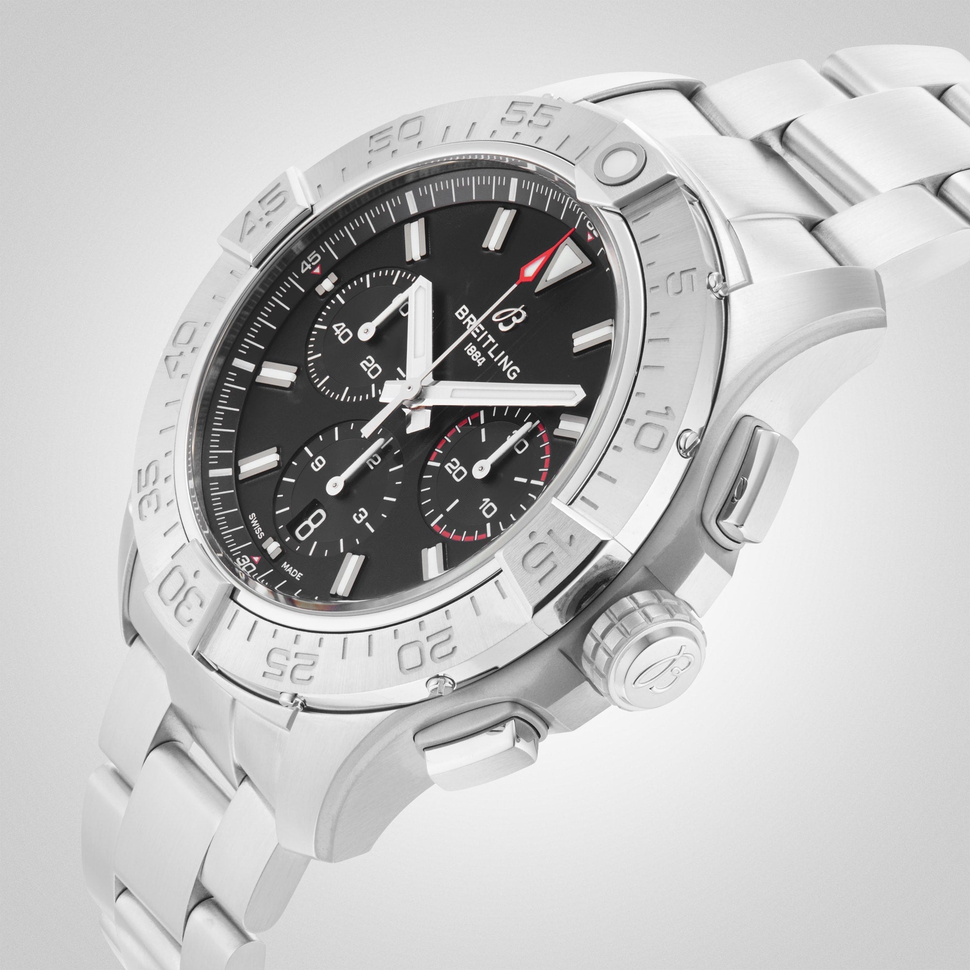 The Breitling Avenger B01 Chronograph 44 wristwatch features a stainless steel case, black dial with three subdials and date display, shown angled on a light background.