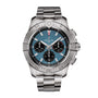 The Breitling Avenger B01 Chronograph 44 is a stainless steel aviation-inspired watch with a blue dial, three black subdials, and a metal link bracelet.
