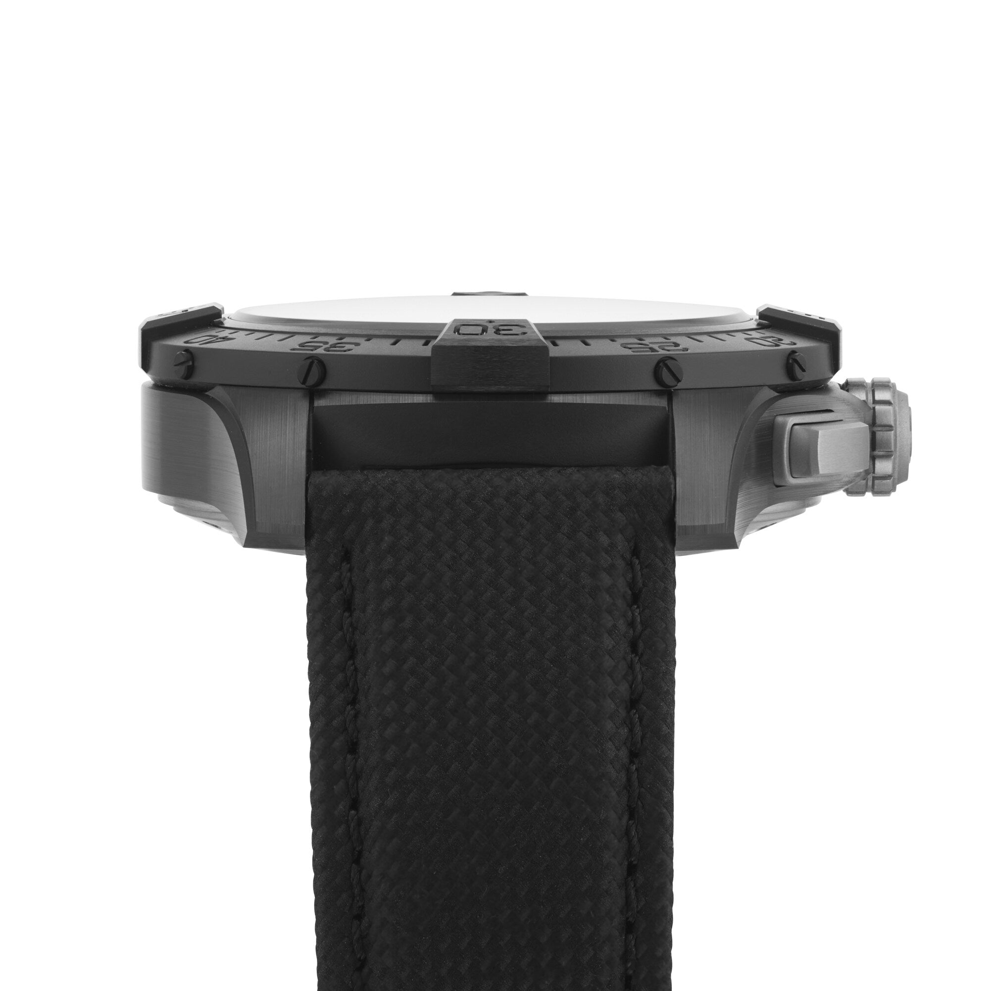 Side view of the Breitling Avenger B01 Chronograph 44 Night Mission, showcasing its ceramic and titanium case, textured black strap, right-side crown, and a remarkable 70-hour power reserve.