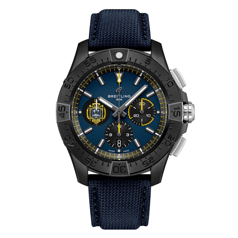 The Breitling Avenger B01 Chronograph 44 Night Mission US Naval Academy features a blue dial, black bezel, yellow accents, three subdials, a blue textured strap, and is powered by the Breitling Manufacture Caliber 01.