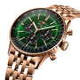 The Breitling Navitimer B01 Chronograph 46 features a gold case, green dial with three black subdials, and a gold link bracelet. This iconic watch is shown against a white background.