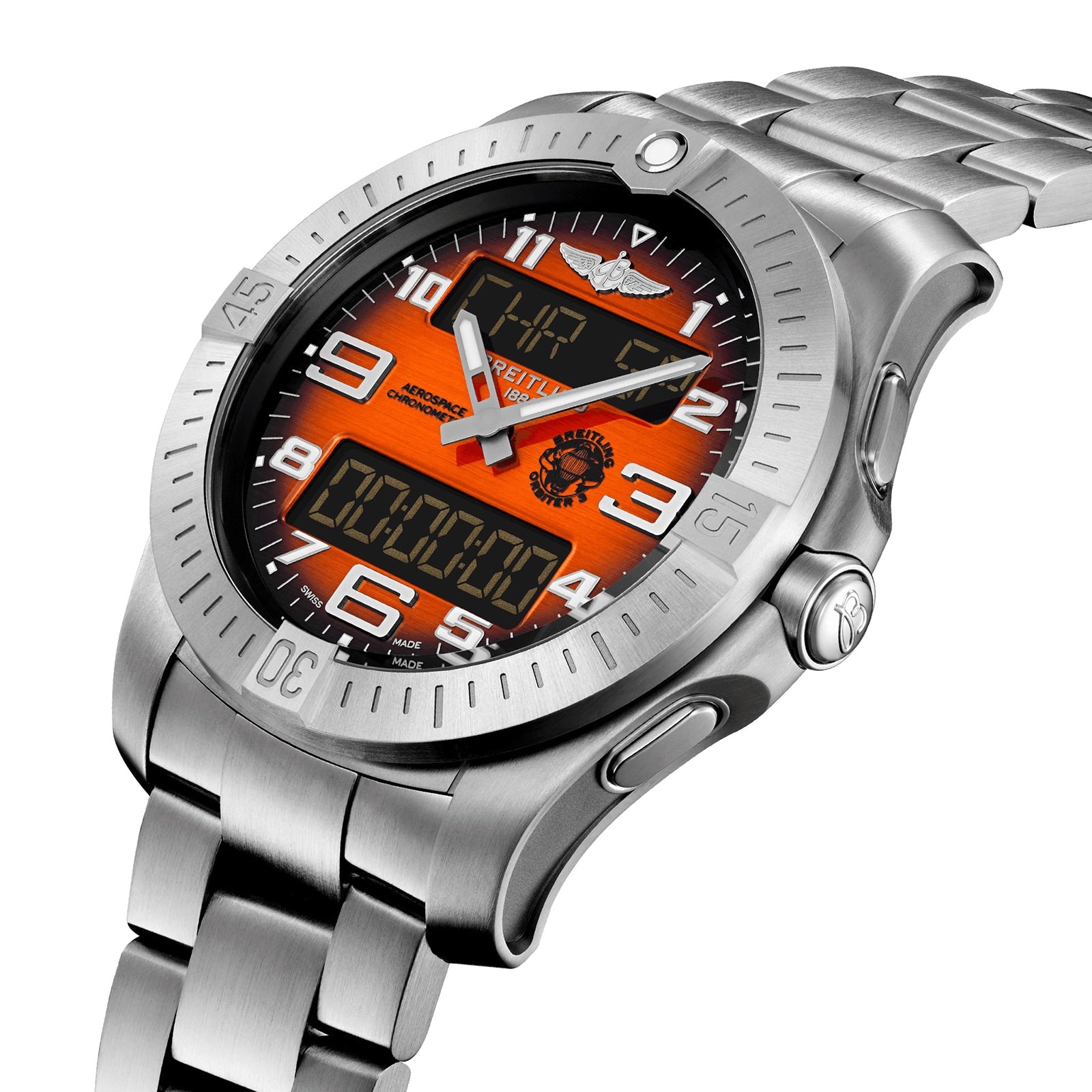 The Breitling Aerospace B70 Orbiter is a stainless steel pilot’s chronograph with an orange dial, white numerals, digital displays, aviation-themed insignia, and a metal link band, powered by the Manufacture Calibre B70.