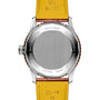A close-up of the back of the Breitling Navitimer Automatic 41 wristwatch, featuring a yellow leather strap, stainless steel case, and aviation-inspired engravings.
