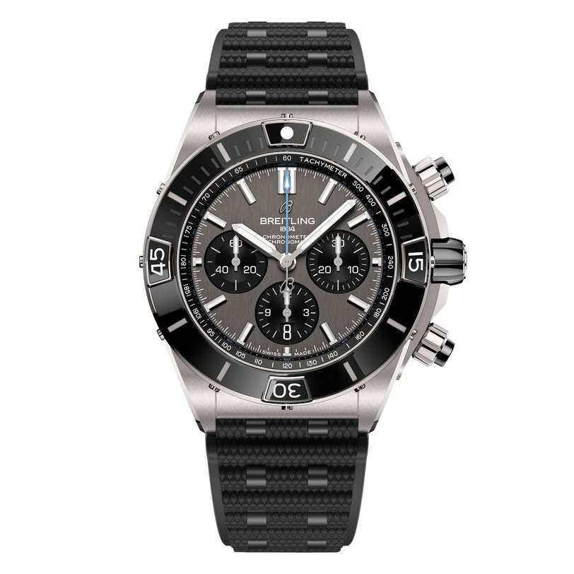 The Breitling Super Chronomat B01 44 is a stainless steel chronograph watch with a black bezel, black textured strap, three subdials, and tachymeter function for precise timekeeping.