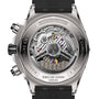 Close-up of the Super Chronomat B01 44 by Breitling, highlighting its exposed Breitling Manufacture 01 calibre movement and engraved details on the robust 44mm titanium case.